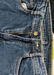 Ripped Blue Denim Jeans