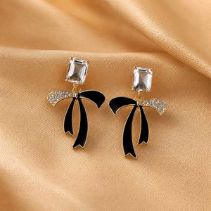 Black Bow Earrings with Crystal Accents