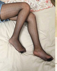 Black Fishnet Tights with Polka Dots