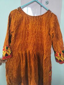 Stylish Angrakha kurti with kutchi work
