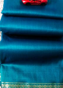 Beautiful Peacock blue Saree with Golden Border