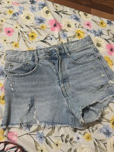 Light Wash Distressed Denim Shorts