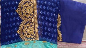 Embroidered Blue designer saree with matching Peti