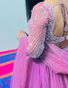 Stunning Pink Tiered Lehenga Choli Set