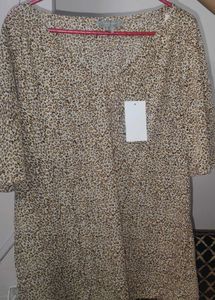 🐆 **Suzannegree Animal Print Tunic Top** 🐆