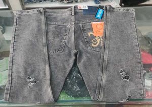 Ripped Grey Jeans
