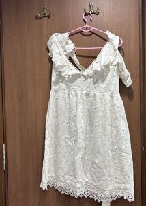Chic White Lace Mini Dress. brand is sotbella