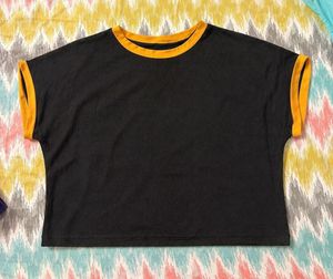 Black cropped T-shirt with mustard yellow neckline