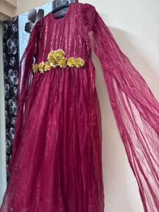 Stunning Burgundy Gown with Floral Embellishment