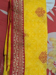 Vibrant Yellow Saree with Red Border