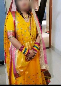 Vibrant Yellow Saree with Colorful Bangles