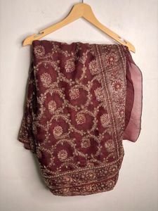 Elegant Maroon Silk Saree with Golden Floral Desig