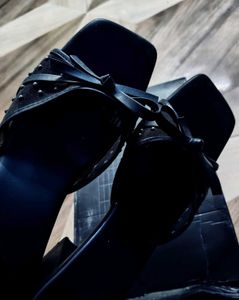 Stylish Black Mules with Bow Detail