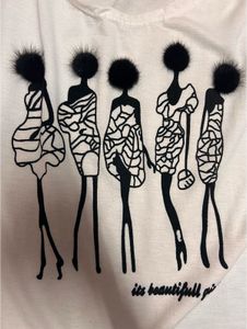 White Top with Black Pom-Pom Graphi