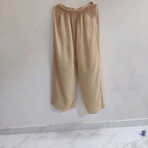 Elegant Beige Palazzos with Embellished Waist