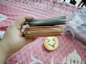 25.Cute Wallets with Pom Poms