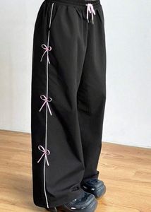 pink bow wide leg track pants
