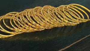 set of 24 Gold Tone glass  Bangles refined