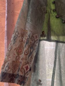 Elegant Green Kurta Set with Intricate Embellishme