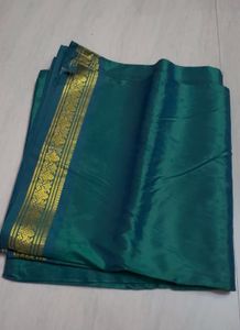 Elegant Teal Saree with Golden Border