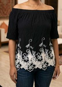 Black Off-Shoulder Top with White Cutwork Lace Hem