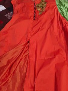Orange Ethnic Gown with Blue Floral Embroidery