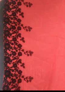 a beautiful red saree with blouse