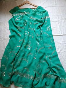 Elegant Green Embroidered Saree with readymade blo