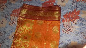 Orange Saree with Gold Motifs
