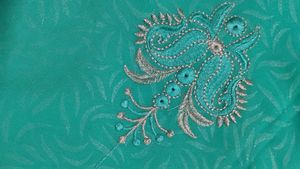 Elegant Turquoise Embroidered Saree
