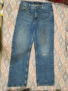 Blue Denim Jeans with Ripped Detail