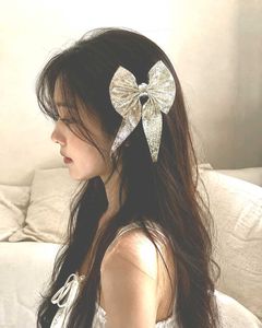 Sparkling Silver Bow Hair Clip