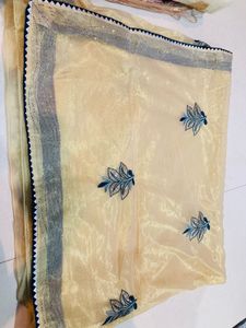 Elegant Embroidered Cream Saree