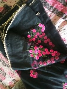 Elegant Black Saree with Pink Floral Print