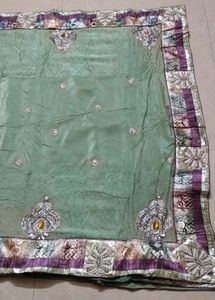 Elegant Green Saree with Embellishment