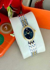 Gucci Gold &amp; Green Watch