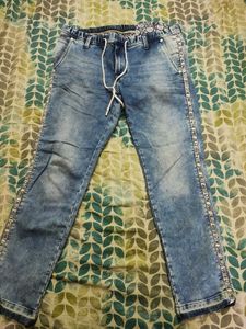 Stylish Acid Wash Jeans with Side Tape Detail