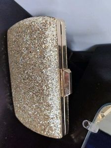 styling and charming gold clutch