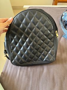 the cutest black mini backpack