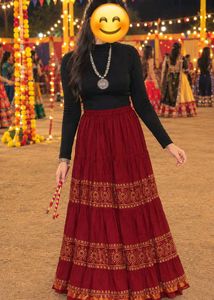 Maroon tiered ethnic skirt and black top
