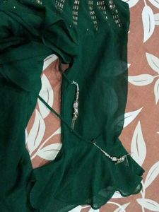 green colour long gown ....  mirror work