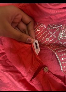 Elegant Red Kurta with Embellished Neckline