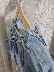 Light Wash Denim Skirt with Tie Detail