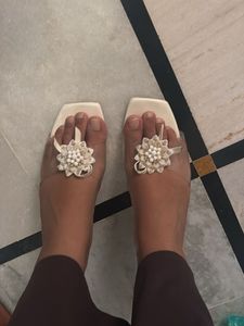 Chic White Flat Sandals with Embellishments