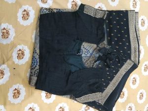 Elegant Black Saree with Blue Bandhej  Print