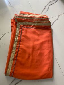 Elegant Orange Saree with Golden Border