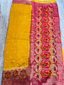 Vibrant Yellow Silk Saree with Intricate Weave