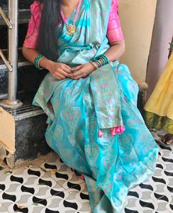 pink blouse blue saree