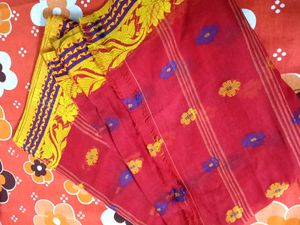 Vibrant Red Saree with Floral Motifs