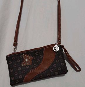Stylish Brown Clutch with Butterfly Detail
